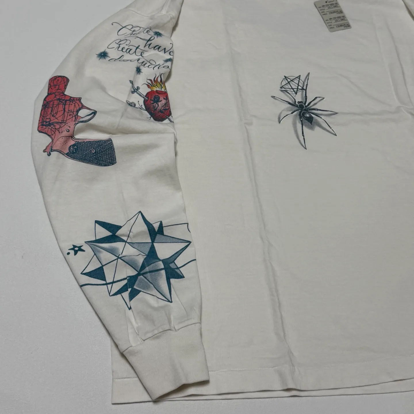 SAINT Mxxxxxx × Dr. Woo DW_LS TEE/TATTOO/WHT Dr.Woo joint model TATOO tattoo long sleeve off-white S-XL OE yarn Tube weaving high weight fabric without side seams Original printing water slurry process No touch printing Breathable and comfortable Original level replica printing Correct version Correct main mark/wash mark/cherub anti-counterfeiting mark